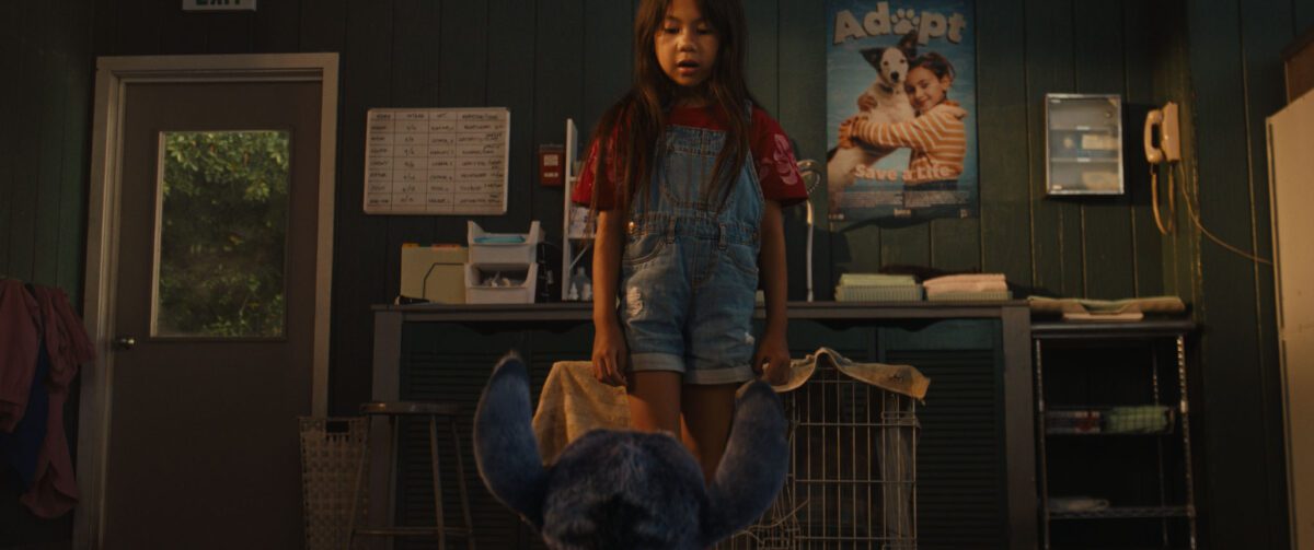 (L-R) Stitch and Maia Kealoha as Lilo in Disney’s live-action LILO & STITCH. Photo courtesy of Disney. © 2024 Disney Enterprises Inc. All Rights Reserved.